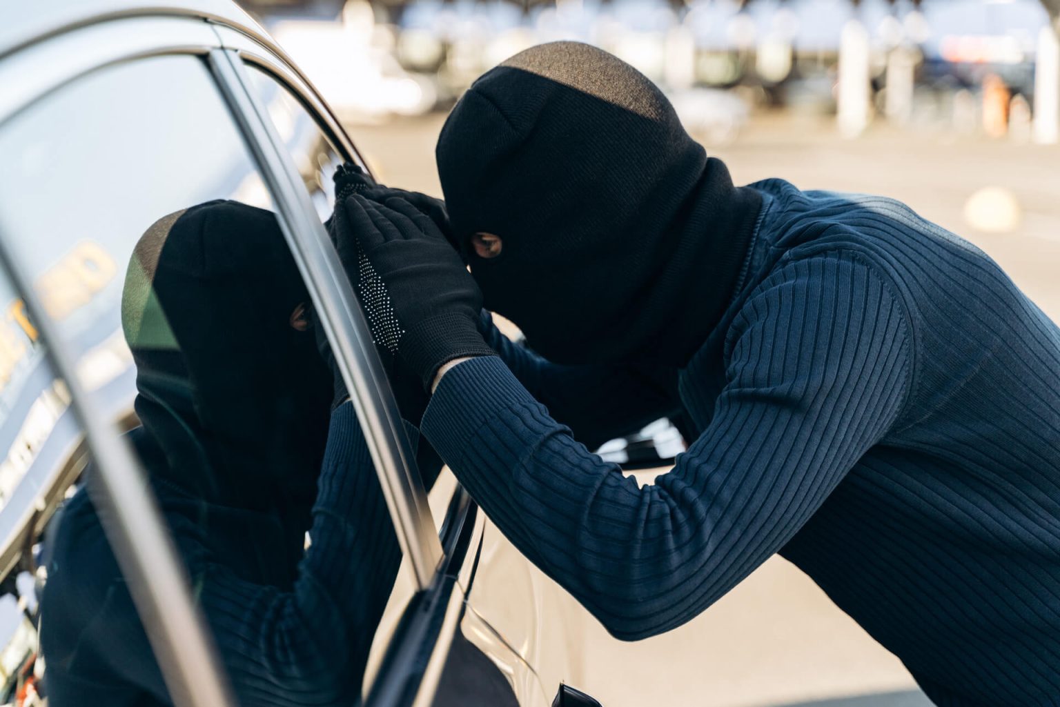 Intruder in a balaclava at night